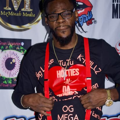 Aboog Carter posing at a media event