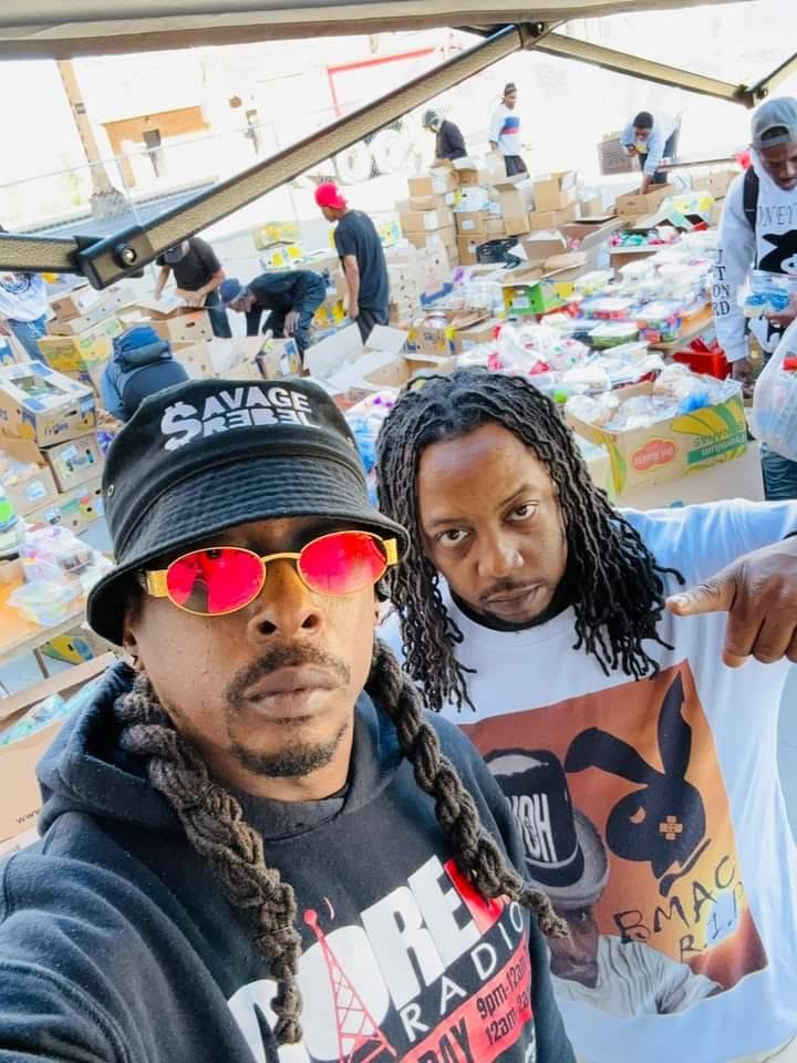 E Jilla Beats at a community distribution event