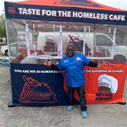 Michael Airhart at the Taste for the Homeless Cafe community setup